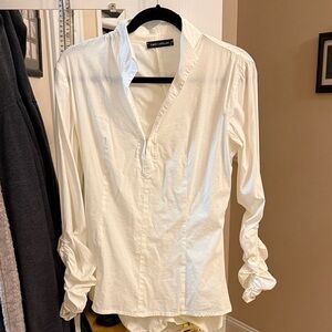 White Blouse by [Brand]